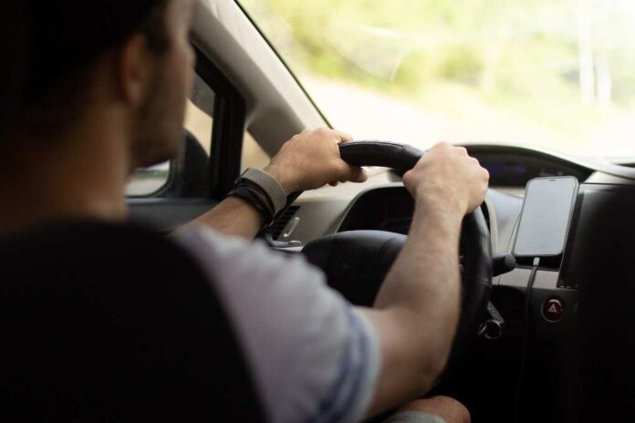 friendly-driver-travel-by-car-the-driver-is-driv-2022-11-11-17-04-21-utc